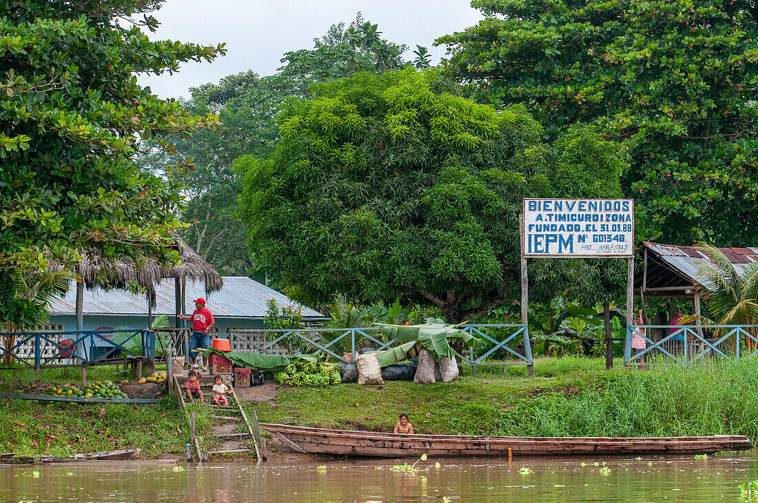 Welcome sign at the Timicuro village on the Amazon River, a tributary of the Amazon, Peru, South America