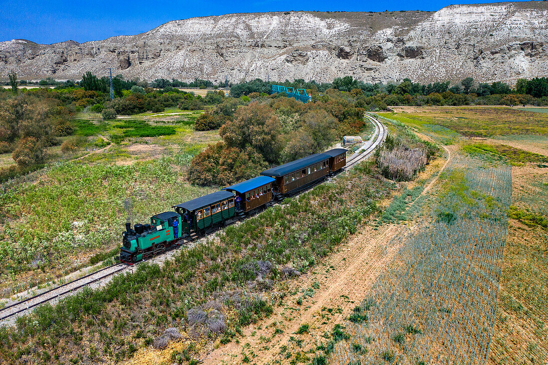 Aerial view, green bridge, puente verde, Jarama river, El Tren de Arganda train or Tren de la Poveda train in Rivas Vaciamadrid, Madrid, Spain.