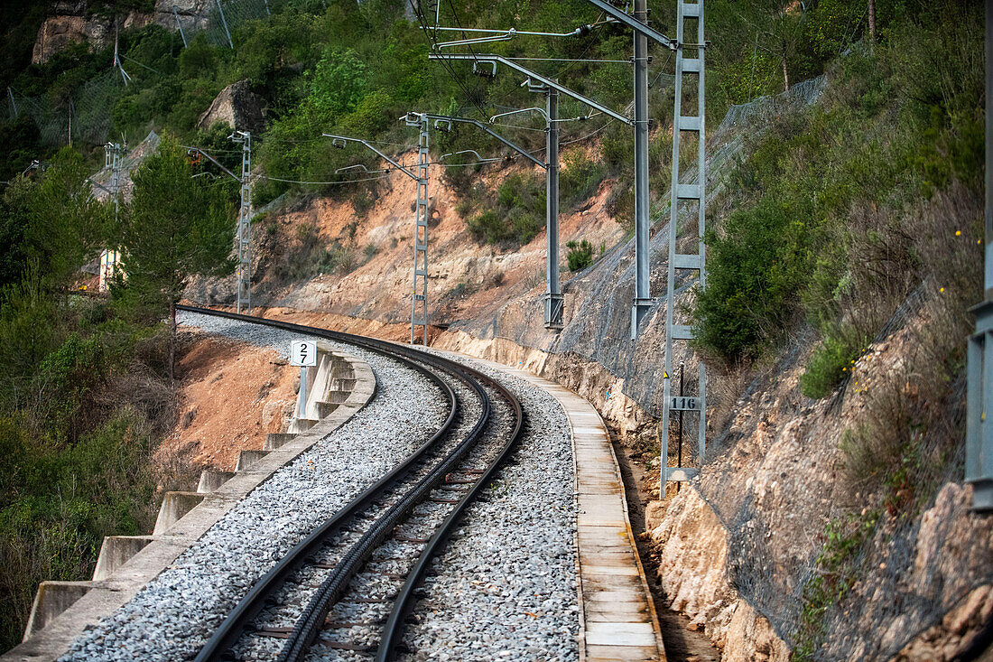 Cremallera Rack railway train climbing up Montserrat mountain, Monistrol de Montserrat, Barcelona, Spain.