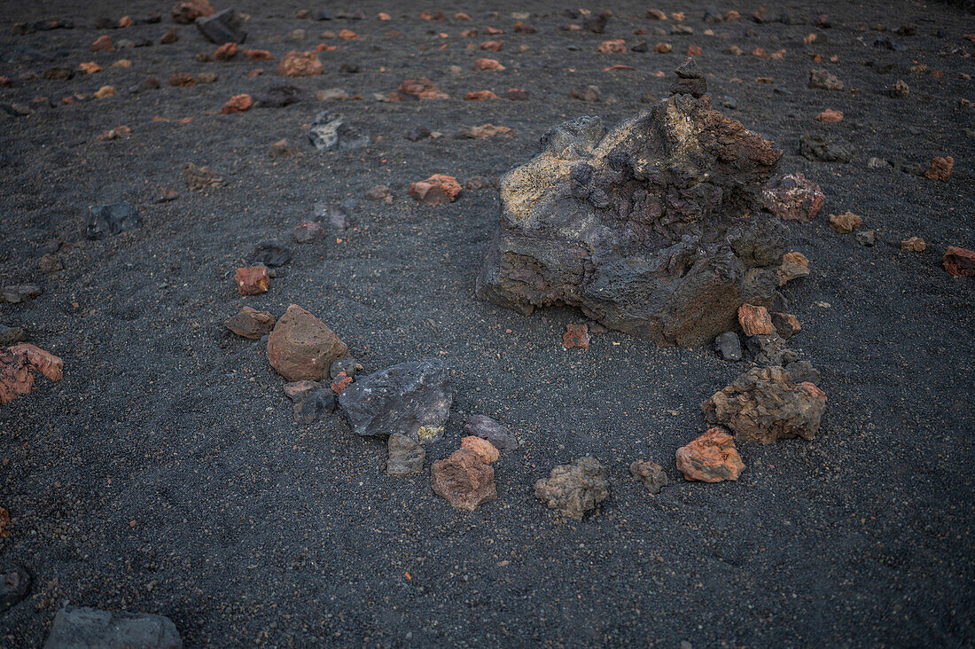 Volcan del Cuervo (Crow volcano) a crater explored by a loop trail in a barren, rock-strewn landscape