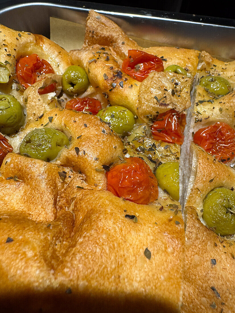 Focaccia with olives and tomato