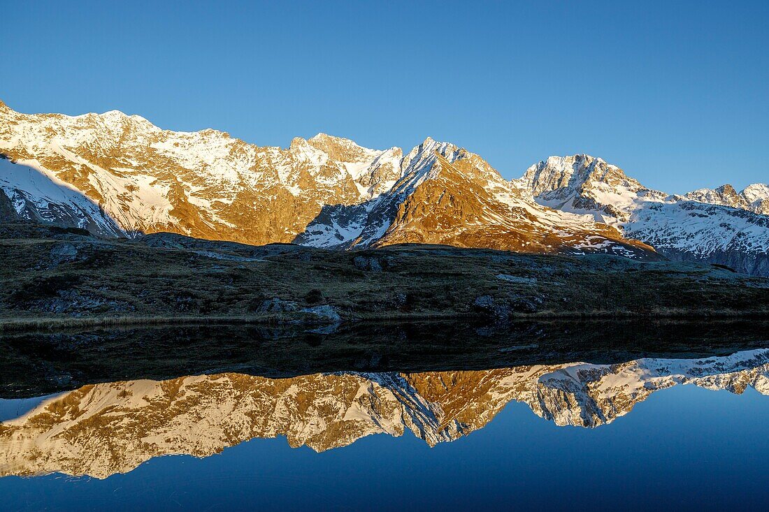 France, Hautes Alpes, Ecrins National Park, valley of Valgaudemar, La Chapelle en Valgaudémar, reflection of the Bans (3669m) and on the right the peak Jocelme (3458m) on the lake Lauzon (2008m)