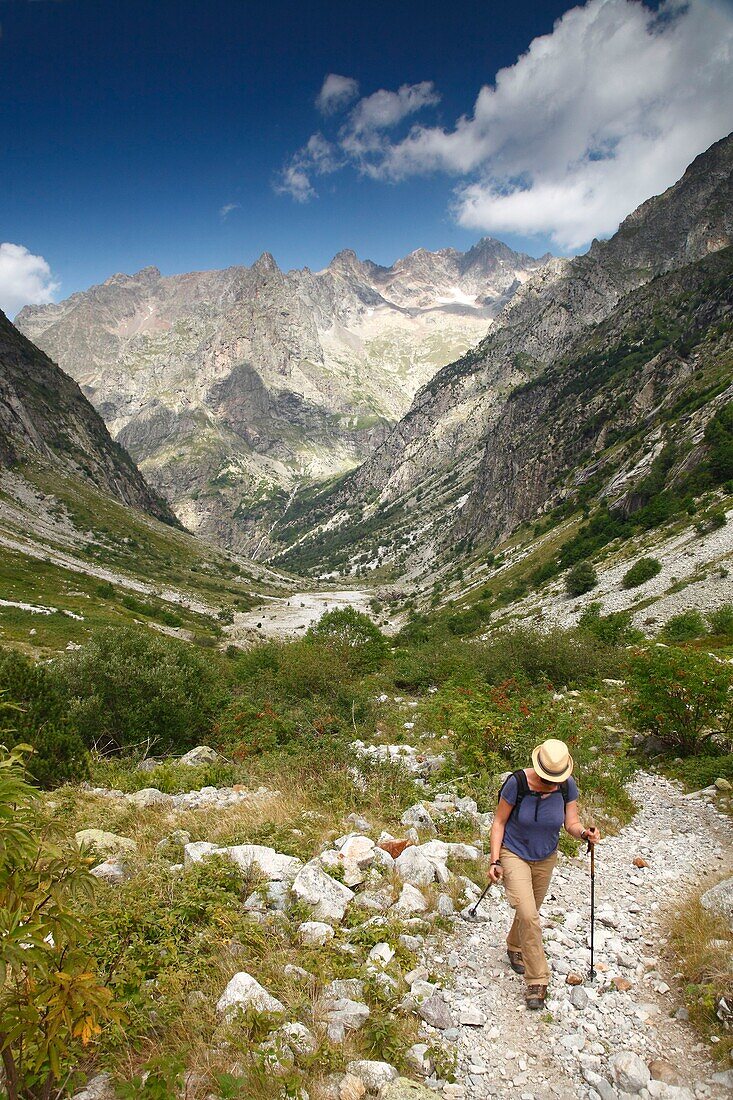 France, Isere, Valjouffrey, Ecrins National Park, Female hiker in the Font Turbat valley