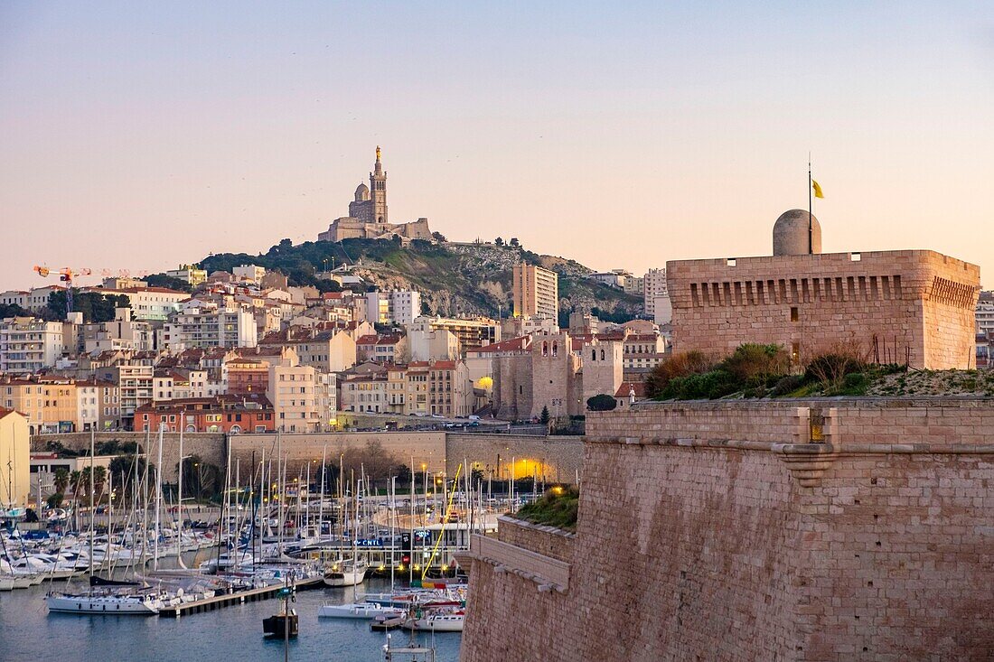 France, Bouches du Rhone, Marseille, the Old Port, Fort Saint Jean and Notre Dame de la Garde basilica