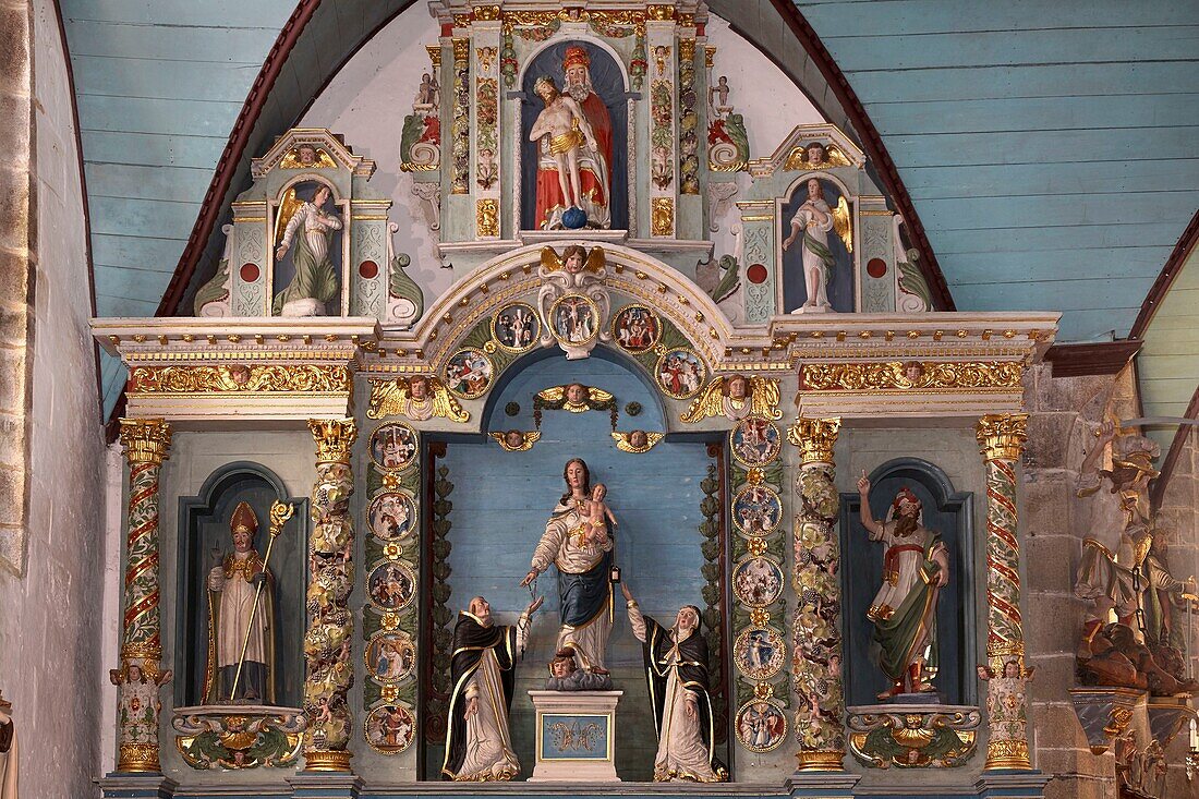 France, Finistere, Guimiliau, Guimiliau Parish close around Saint Miliau church, polychrome altarpiece of the Rosary