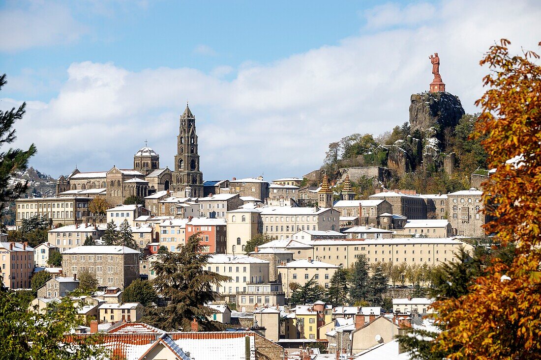 France, Haute Loire, Le Puy en Velay, step on the way to Saint Jacques de Compostela, view of the city with the statue Notre Dame de France (1860) at the top of the rock Corneille and Notre Dame Cathedral of the Annunciation of the twelfth century
