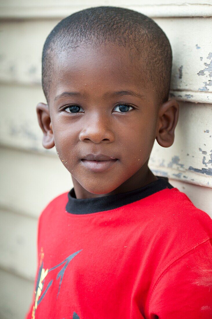 France, French Guiana, Cayenne, portrait of a young boy