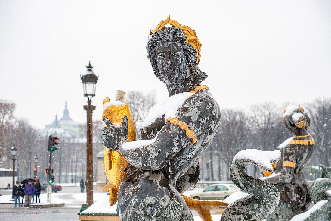 France, Paris, Place de la Concrode, the fountain of the rivers under the snow