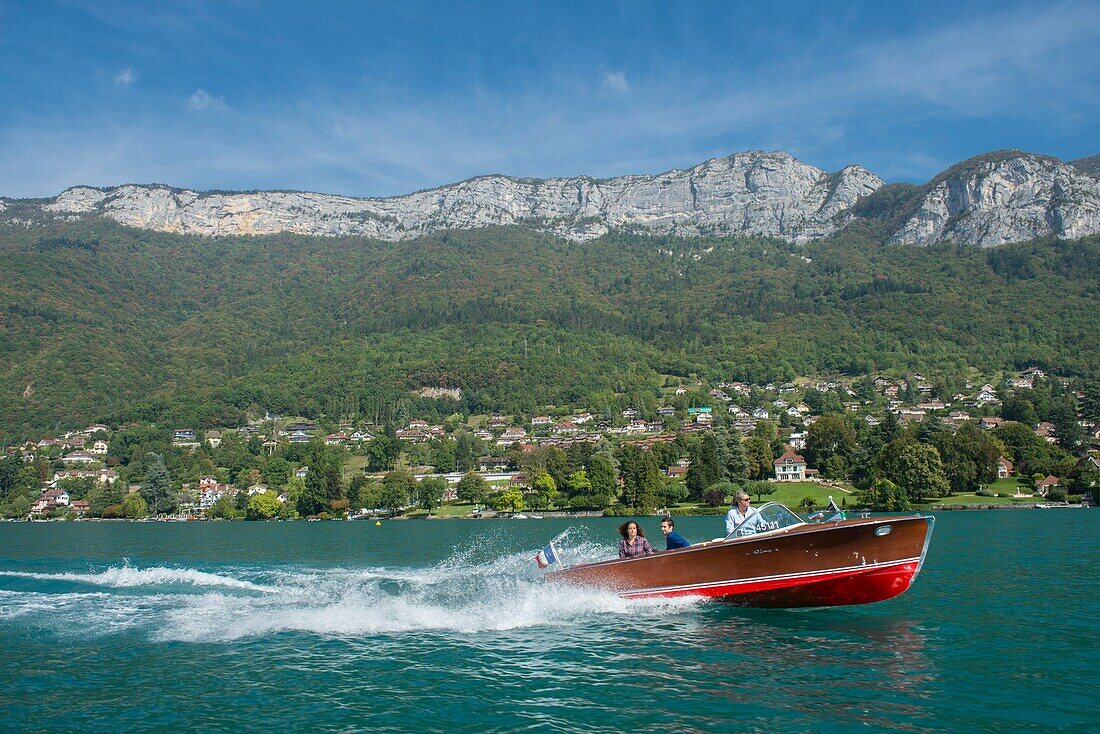 France, Haute Savoie, Annecy, boat trip on the lake Riva, with the mountain and the shore of Veyrier