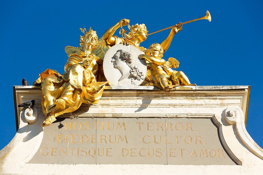 France, Meurthe et Moselle, Nancy, Stanislas square (former royal square) built by Stanislas Leszczynski, king of Poland and last duke of Lorraine in the 18th century, listed as World Heritage by UNESCO, detail of sculptures on top of the Arc de Here (Here arch) named Groupe de la Renommee