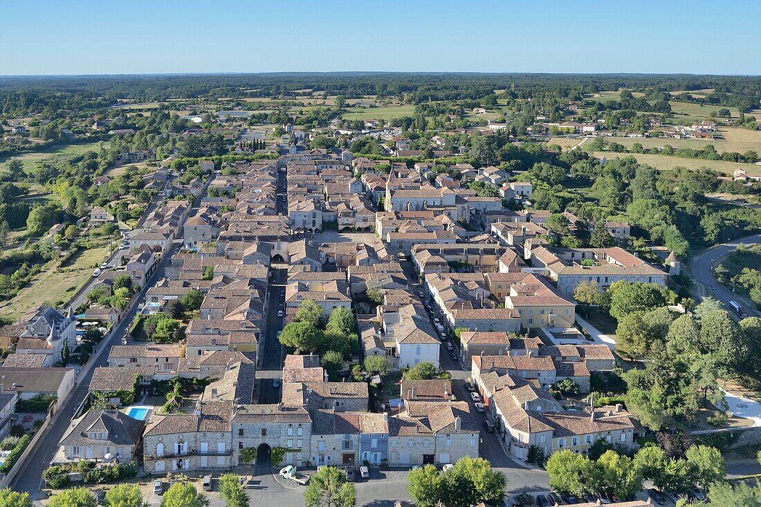 France, Dordogne, Monpazier, labelled Les Plus Beaux Villages de France (The Most Beautiful Villages of France), the walled city square and the church (vue aerienne)
