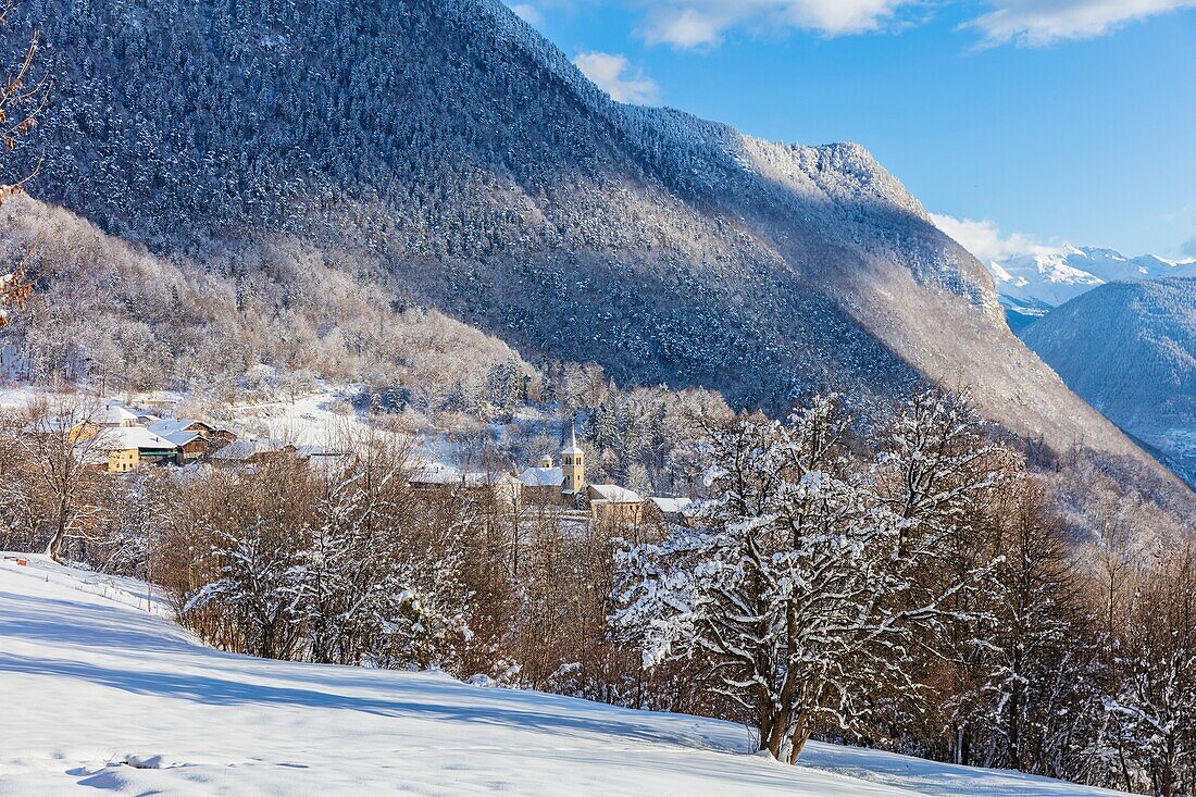 France, Savoie, Grand-Aigueblanche, Tarentaise Valley, Baroque church of St Martin on the 17th century in the hamlet of Villargerel, view of the 3Vallées ski area