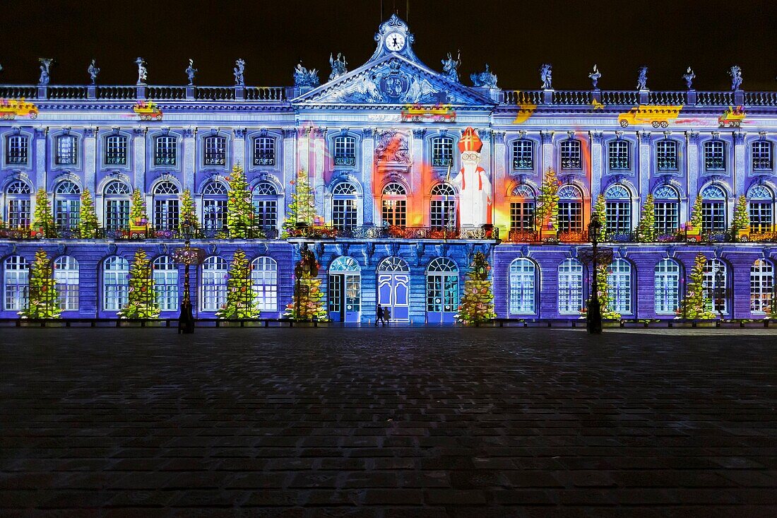 France, Meurthe et Moselle, Nancy, Stanislas square (former royal square) built by Stanislas Leszczynski, king of Poland and last duke of Lorraine in the 18th century, listed as World Heritage by UNESCO, facade of the townhall during the lightshow dedicated to Saint Nicolas