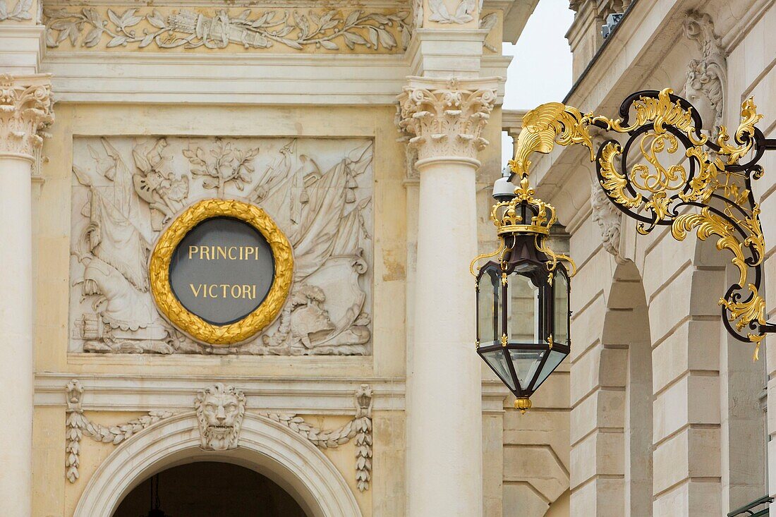 France, Meurthe et Moselle, Nancy, Stanislas square (former royal square) built by Stanislas Leszczynski, king of Poland and last duke of Lorraine in the 18th century, listed as World Heritage by UNESCO, detail of the Arc Here (Here arch) and of a street lamp by Jean Lamour