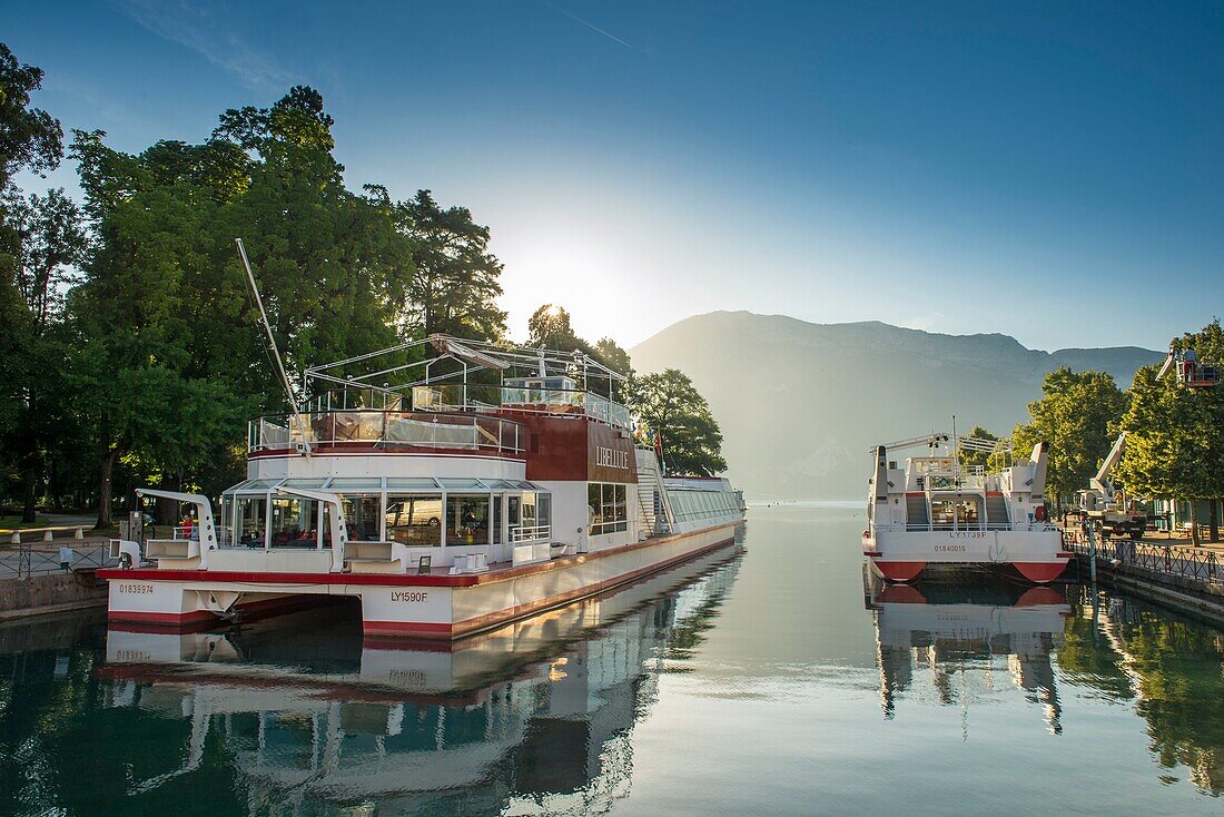 France, Haute Savoie, Annecy, the Dragonfly boat docked on the Thiou Canal in the lake