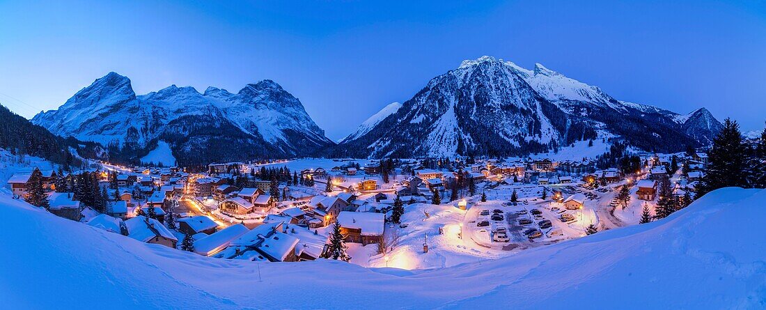 France, Savoie, Massif de la Vanoise, Pralognan La Vanoise, National Park, panoramic view the village at dawn and the Grand Marchet mountain, and teeth of Portetta,