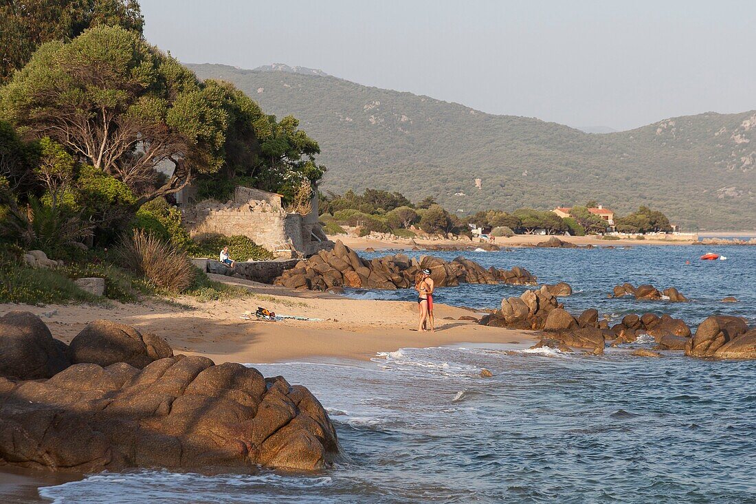 France, Corse du Sud, Serra di Ferro, couple on the Porto Pollo beach