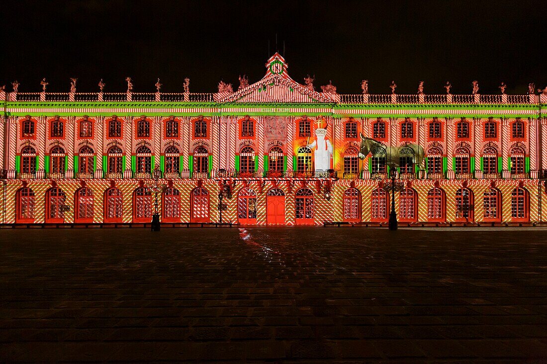 France, Meurthe et Moselle, Nancy, Stanislas square (former royal square) built by Stanislas Leszczynski, king of Poland and last duke of Lorraine in the 18th century, listed as World Heritage by UNESCO, facade of the townhall during the lightshow dedicated to Saint Nicolas