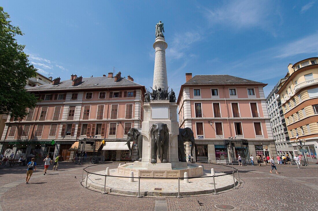 France, Savoie, Chambery, the restored monument of the elephant fountain called four without culverts and the column of the statue of the Count Boigne Savoieard sculptor Pierre Victor Sappeyan