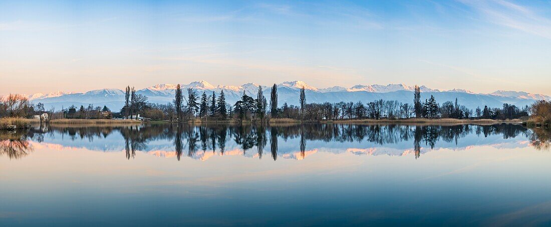 France, Savoie, Les Marches, Lake Saint André in the heart of the Combe de Savoie vineyards, Belledonne range covered with snow in the background