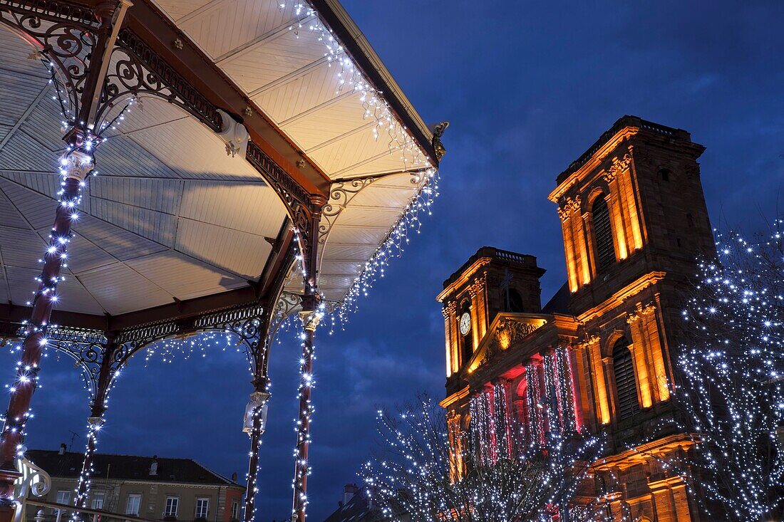 France, Territoire de Belfort, Belfort, Place d Armes, kiosk, Saint Christophe cathedral dated 18th century, Christmas lights