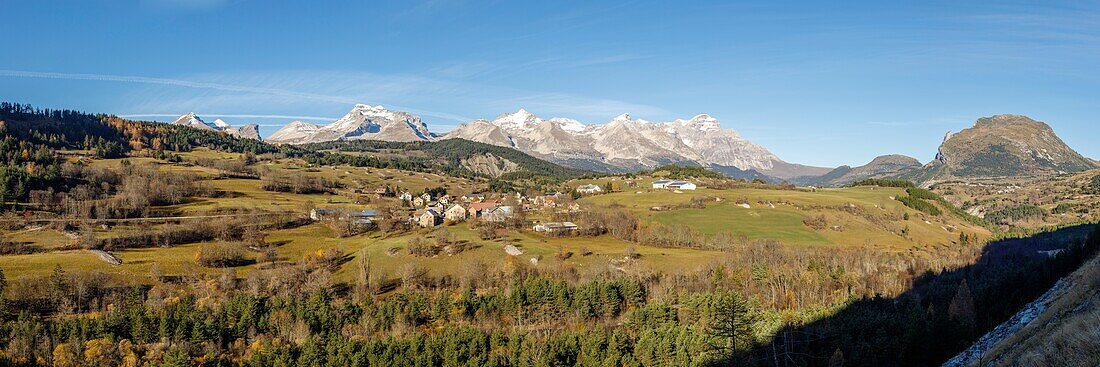 France, Hautes Alpes, Dévoluy massif, Saint Etienne en Devoluy, village Courtil, in the background from left to right, the summit of Grand Ferrant (2758m), the Tête de l'Aupet (2627m), the Tête de la Cavale (2697m) and the Grande Tête de l'Obiou (2789m)