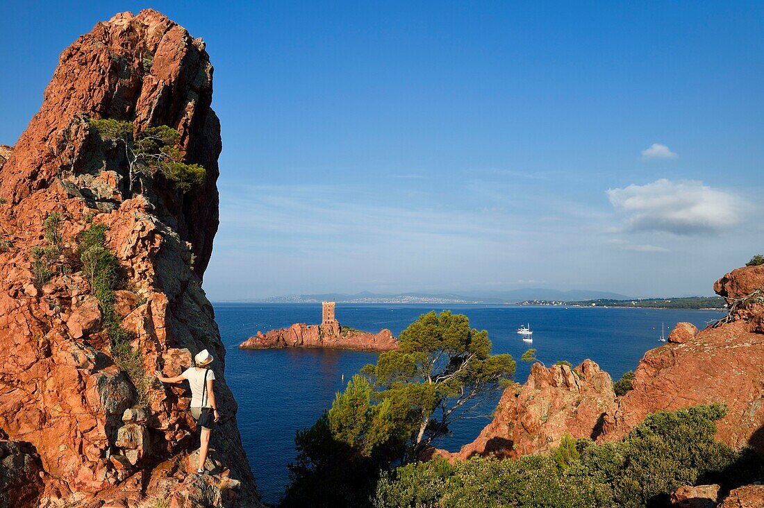 France, Var, Agay area next to Saint Raphael, Massif de l'Esterel (Esterel Massif), the Corniche d'Or, the ile d'Or island tower next to the Dramont cape