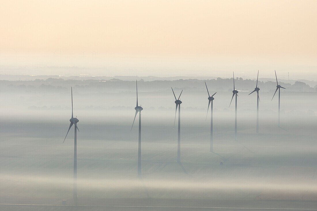 France, Vendee, Le Langon, wind turbines in the mist (aerial view)