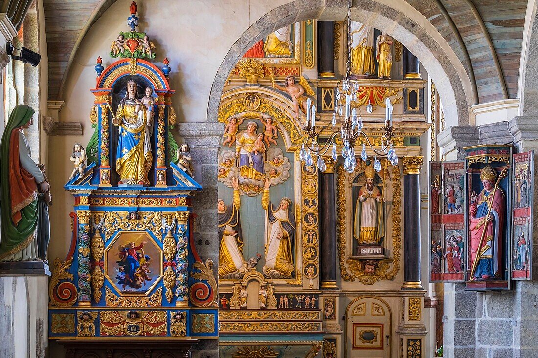 France, Finistere, Saint Thegonnec, step on the way to Santiago de Compostela, the Parish close of the 16th and 17th centuries, Notre Dame church, Notre Dame du Vrai Secours altarpiece and Rosary altarpiece in the background