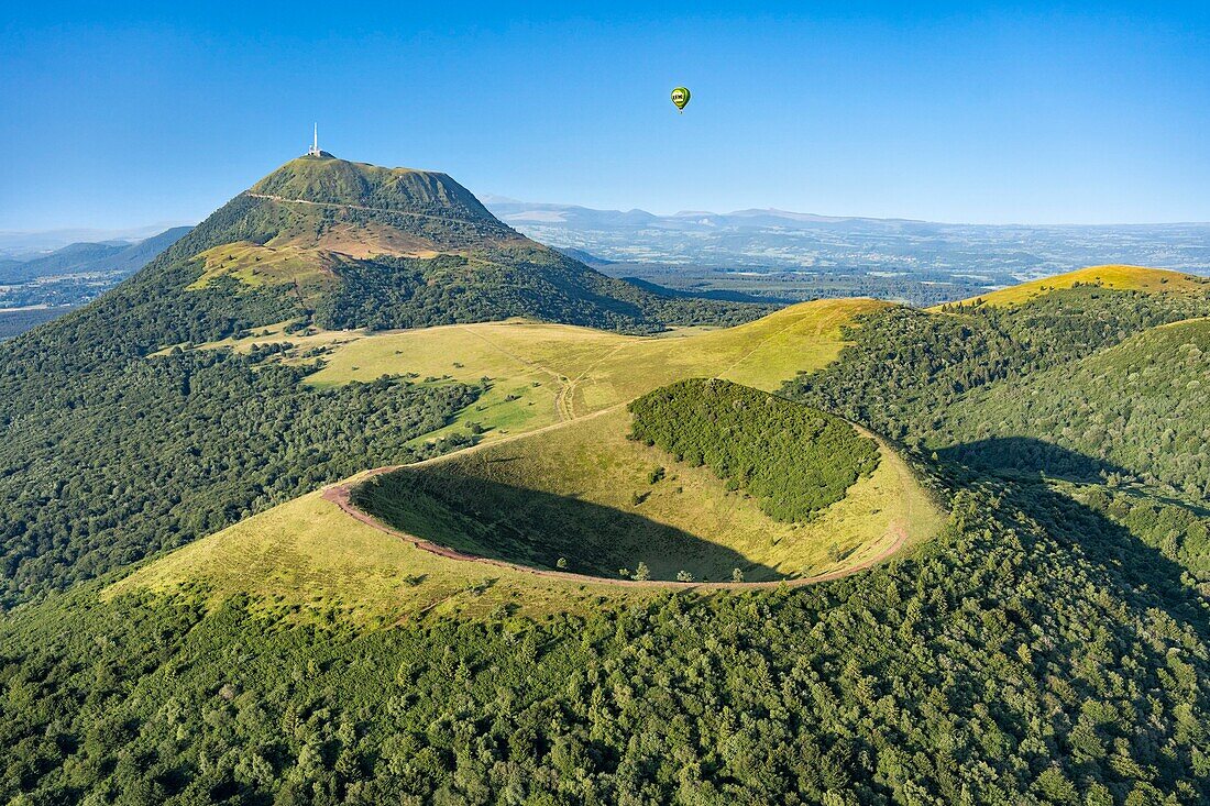 France, Puy de Dome, Orcines, Regional Natural Park of the Auvergne Volcanoes, the Chaîne des Puys, listed as World Heritage by UNESCO, Puy Pariou volcano in the foreground (aerial view)