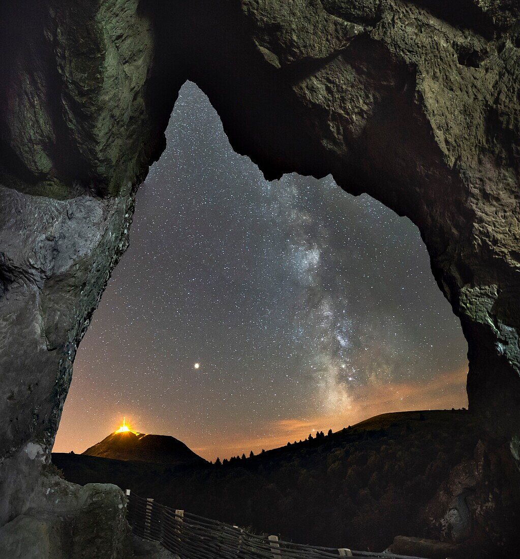 France, Puy de Dome, the Regional Natural Park of the Volcanoes of Auvergne, Chaine des Puys, listed as World Heritage by UNESCO, Orcines, night view of the Puy de Dôme from caverns of volcano Le Cliersou