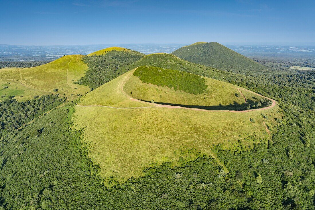 France, Puy de Dome, Orcines, Regional Natural Park of the Auvergne Volcanoes, the Chaîne des Puys, listed as World Heritage by UNESCO, Puy Pariou volcano in the foreground (aerial view)