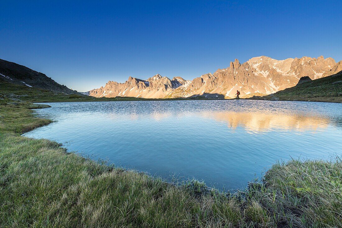 France, Hautes Alpes, Nevache, La Clarée valley, reflection of the Cerces massif (3093m) on an unnamed lake between Lakes Long and Round, in the center the peaks of the Main de Crépin (2942m)