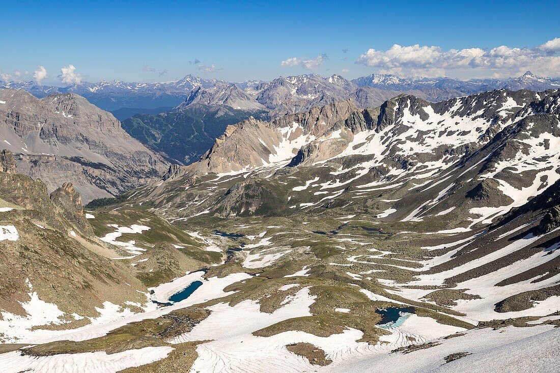 France, Hautes Alpes, Nevache, the high narrow valley, on the left the white lake (2614m) and the lake Chardonnet (2599m) since the Col des Muandes (2828m) on the GR 57