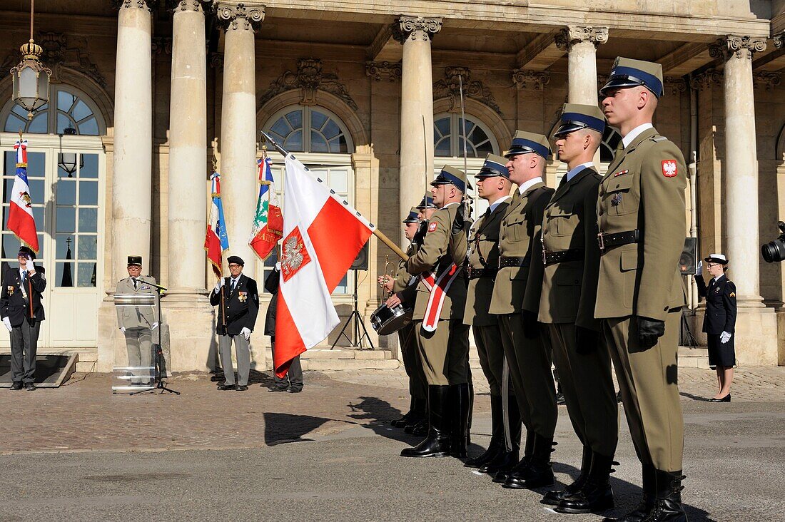 France, Meurthe et Moselle, Nancy, Place de la Carrière built by Stanislas Leszczynski King of Poland and last Duke of Lorraine in the eighteenth century, Government Palace classified as World Heritage by UNESCO, commemoration of the centenary of the Renaissance of Poland on October 23, 2018, military at attention carrying the Polish flag
