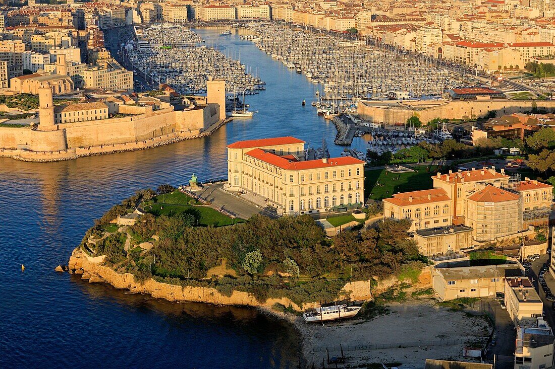 France, Bouches du Rhone, Marseille, 7th arrondissement, Pharo Cove, the Palais du Pharo, the Old Port and the Fort Saint Jean listed as a Historic Monument in the background (aerial view)