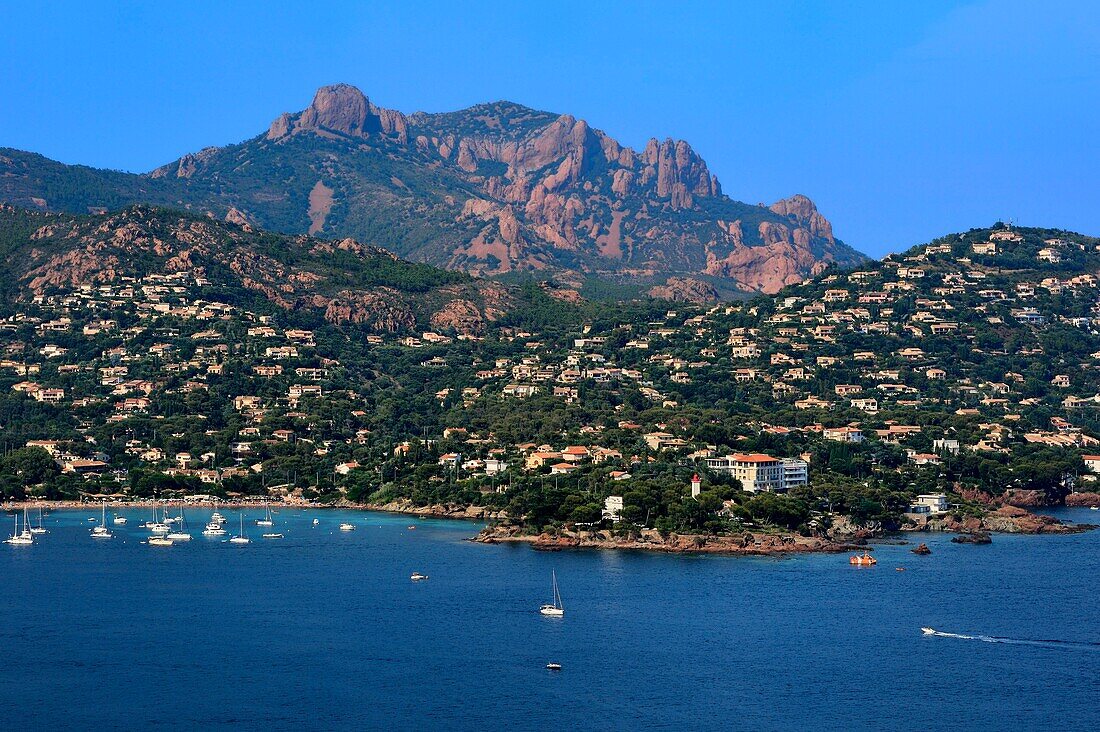 France, Var, Agay area next to Saint Raphael, Massif de l'Esterel (Esterel Massif), the harbor and village of Agay, the peak of Cap Roux in the background