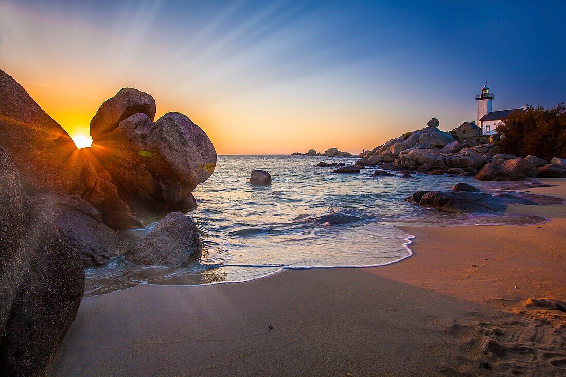 France, Finistere, Pays des Abers, Brignogan Plages, the Pontusval Lighthouse on the Pointe de Beg Pol at sunset