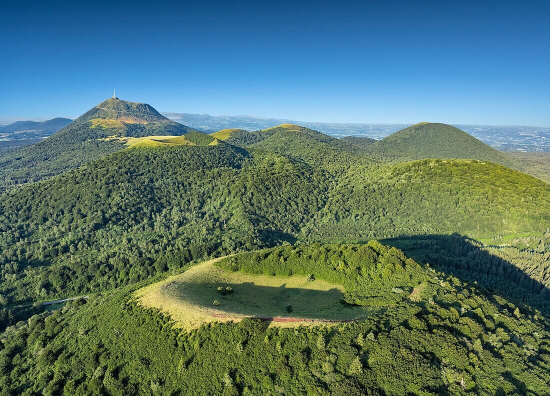 France, Puy de Dome, Orcines, Regional Natural Park of the Auvergne Volcanoes, the Chaîne des Puys, listed as World Heritage by UNESCO, Puy des Goules in the foreground (aerial view)