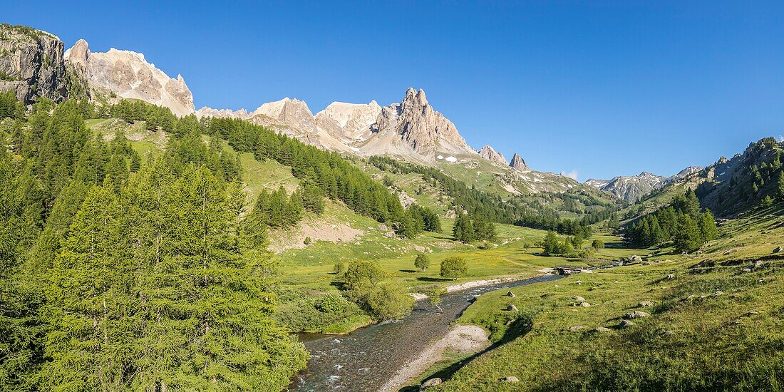 France, Hautes Alpes, Nevache, La Claree valley, the Pont du Moutet, in the background the massif of Cerces (3093m) and the peaks of the Main de Crepin (2942m)