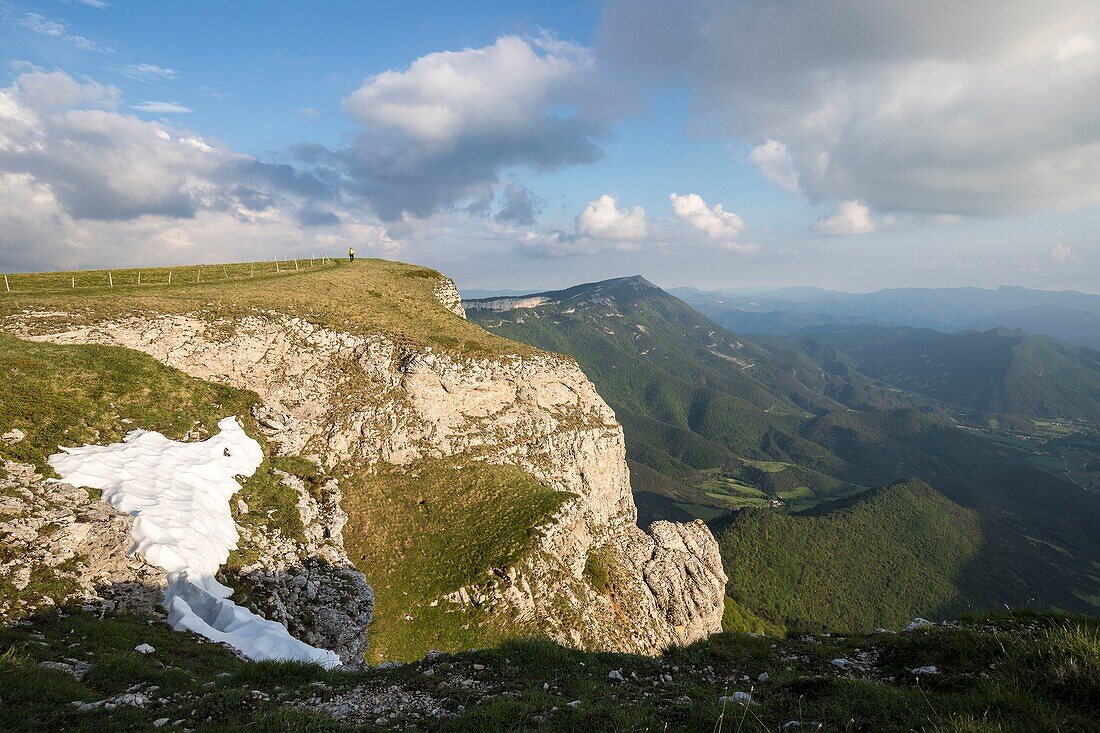 France, Drome, Vercors Regional Natural Park, hiker on the crest path of the Font d'Urle plateau overlooking the Diois