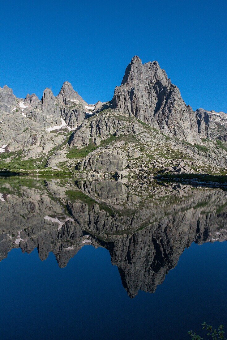 France, Haute Corse, Corte, Restonica Valley, in the Regional Natural Park Lake Melo and from left to right, the peaks of the 7 lakes, Capitello and Lombardiccio