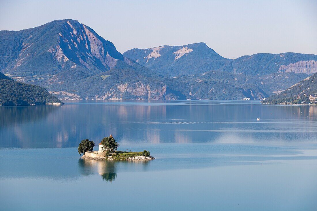 France, Hautes Alpes, the lake of Serre Poncon, Saint Michel chapel of the 12th century on Saint Michel islet