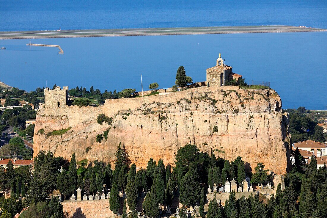 France, Bouches du Rhone, Vitrolles, the rock, Notre Dame de Vie chapel, Sarrasine tower (XI century), listed as a historical monument, the Marseille Provence airport and Etang de Berre in the background (aerial view)