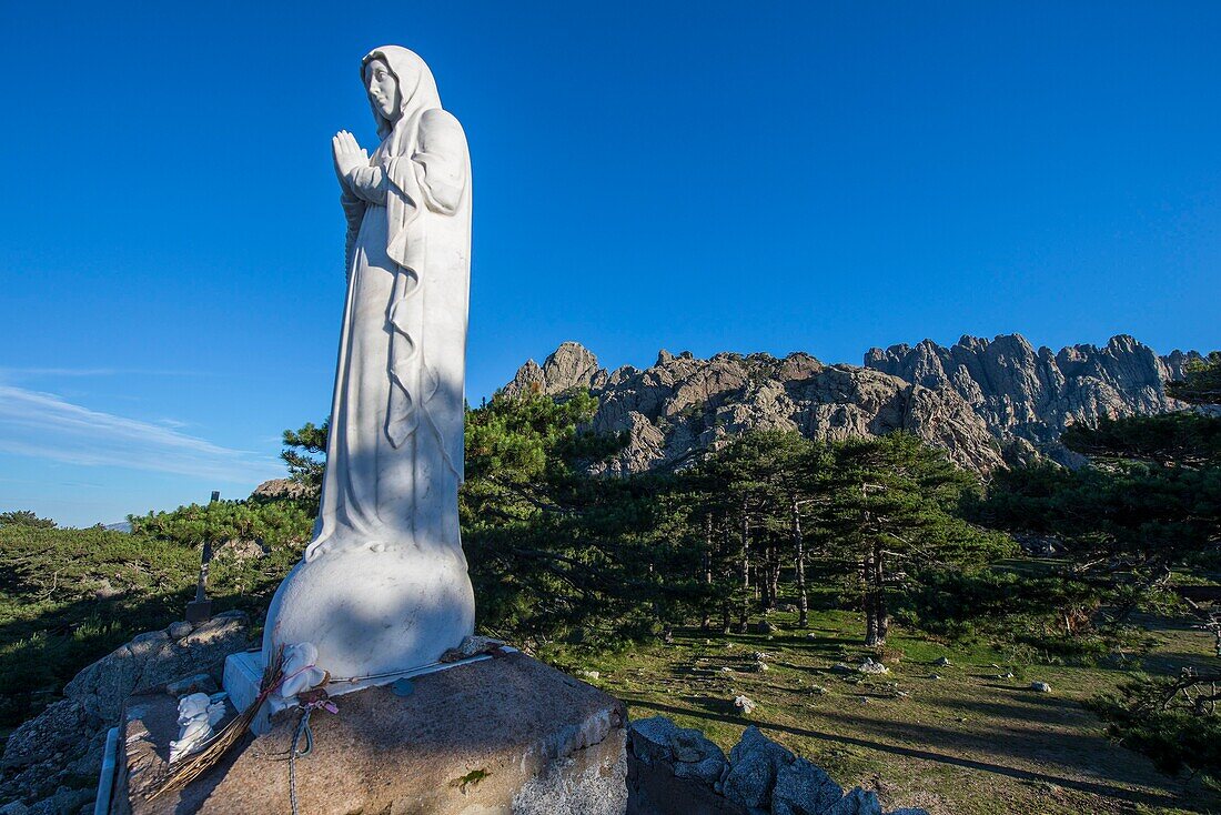 France, Corse du Sud, Alta Rocca, the statue of the Virgin at the Bavella Pass and the Bavella Needles