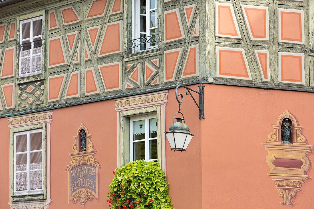 France, Haut Rhin, Route des Vins d'Alsace, Colmar, facade of a half timbered house in trompe l'oeil on Place de l'Ancienne Douane (former custom square)