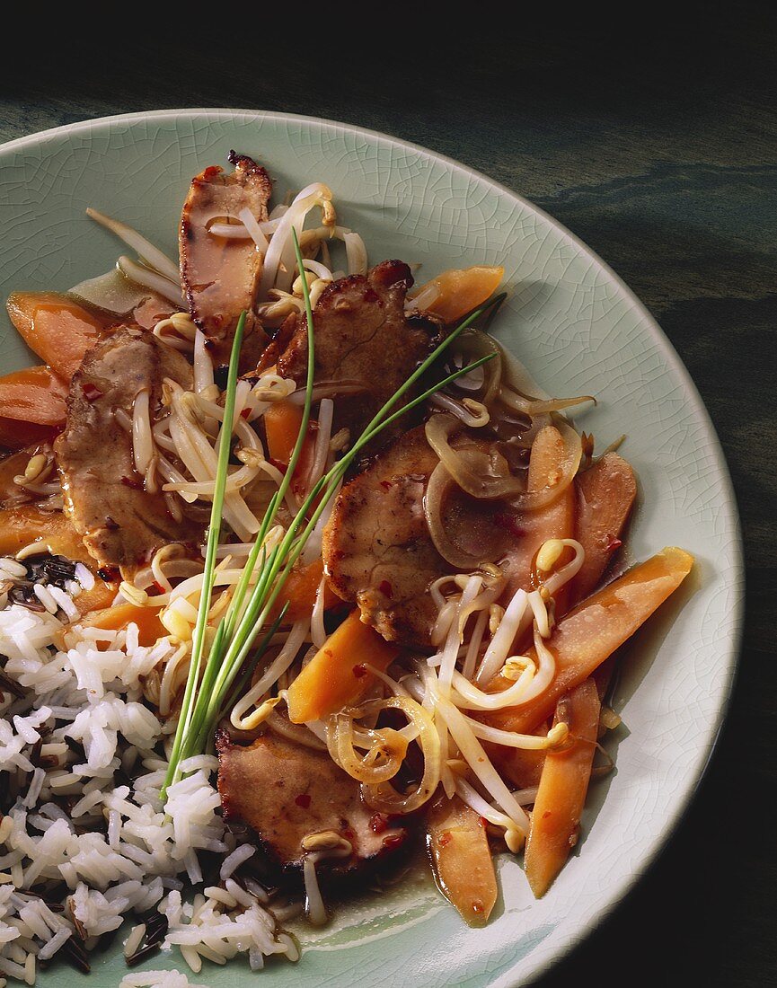 Asian pork with vegetables, sprouts and rice