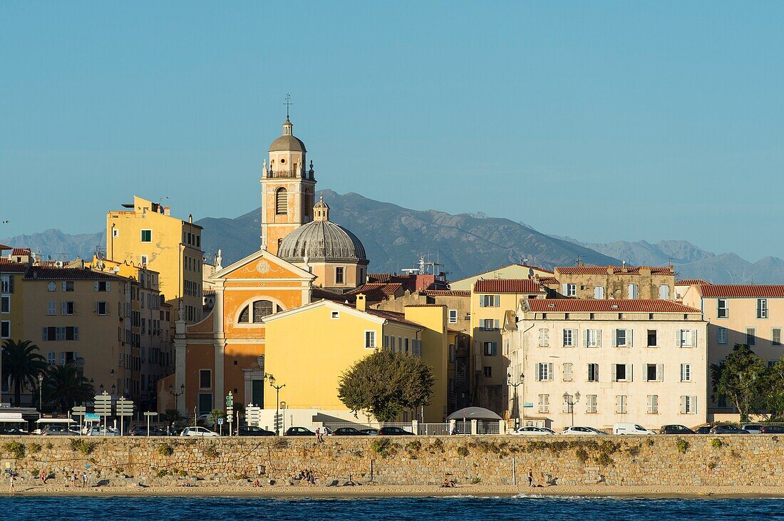 France, Corse du Sud, Ajaccio, beach, old town and the steeple of the cathedral seen from the sea