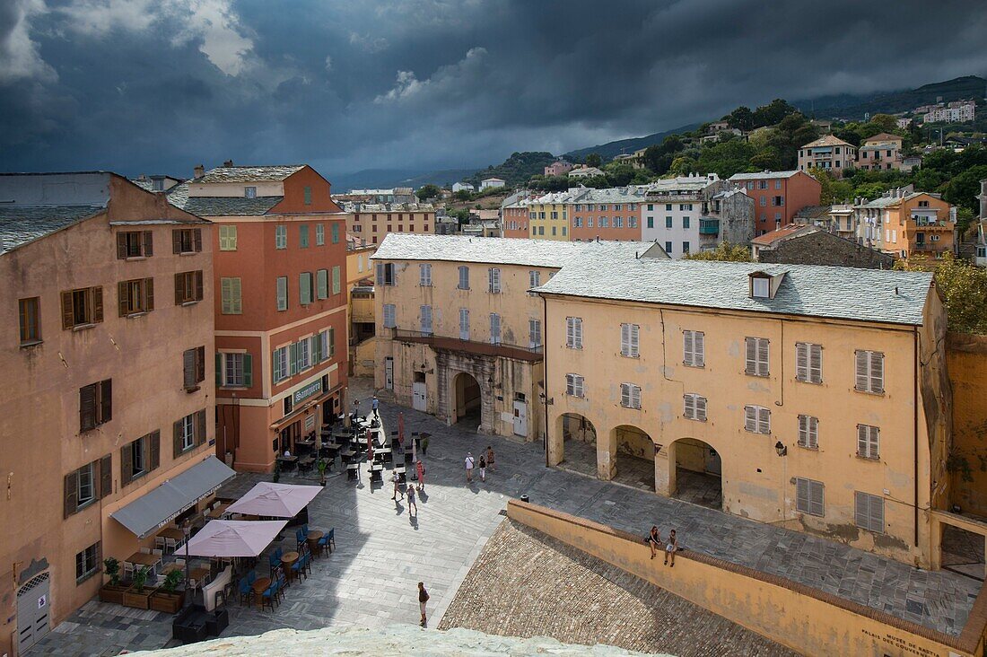 France, Haute Corse, Bastia, in the citadel, the dungeon square seen from the terraces of the ethnographic museum, former governor's palace under a stormy sky