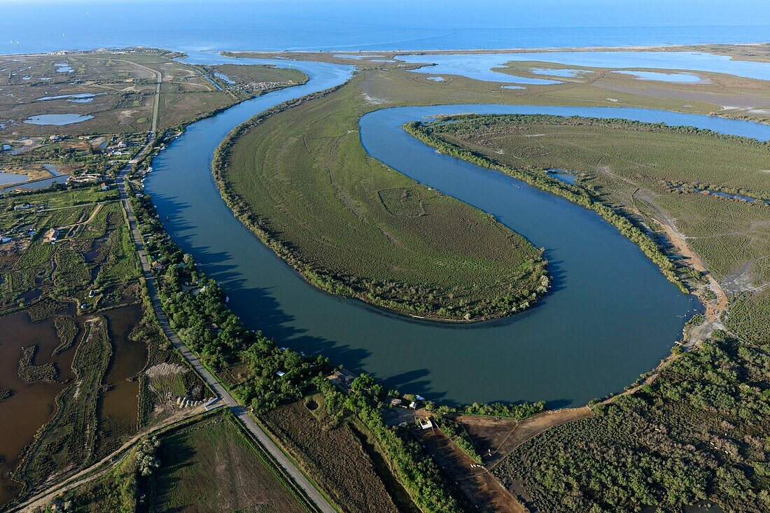 France, Bouches du Rhone, Saintes Maries de la Mer, Regional Natural Park of Camargue, the small Rhône (aerial view)